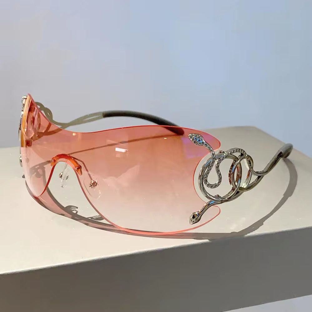 ROBERTA - Oversize Sonnenbrille mit Schlangendetails